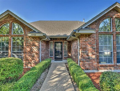 NICE VIEW OF ENTRY AND SMALL COVERED PORCH WITH ST
