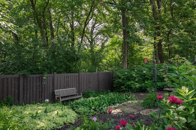 Partial maintenance free privacy fence and garden.