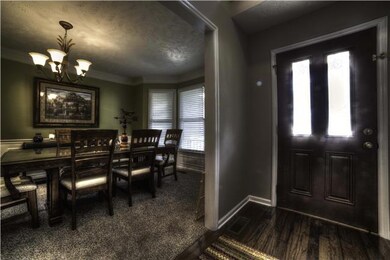 Nice foyer with hardwood floor and two large closets