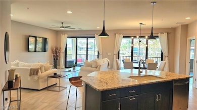 15145 Palmer Lake Cir unit 201, Naples, FL 34109 - photo 2