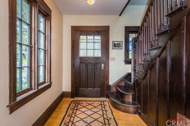 View of the foyer. Features include numerous windo