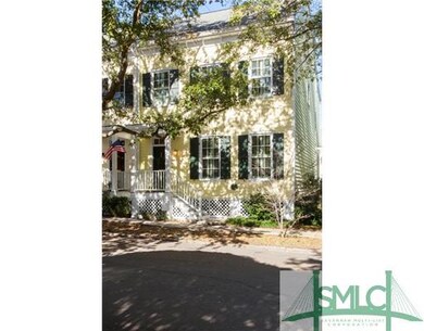 Exterior Front. Classic side hall townhouse in His