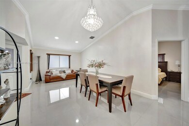 Formal Living Room/Dining Room area with Frosted Glass Impact window for privacy