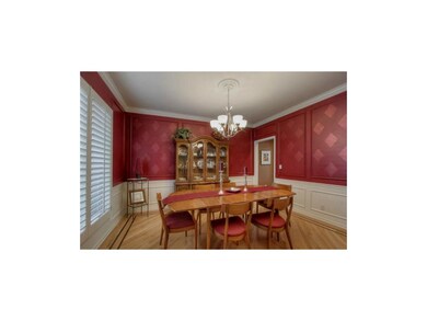 Formal Dining Room w/ hardwood floors.