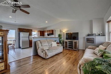 Open Living Room with Hardwood Floors!