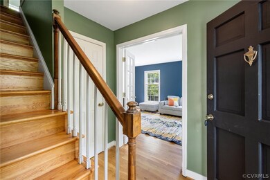 Foyer with light hardwood / wood-style flooring