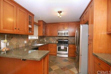 Kitchen with stainless appliances.