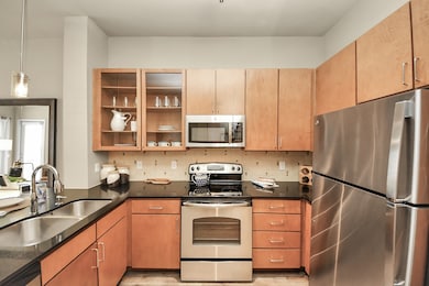 Photos are not of actual units, similar floor plan finishes