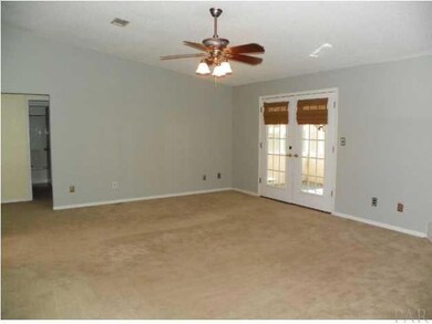 Great room with french doors to screened porch