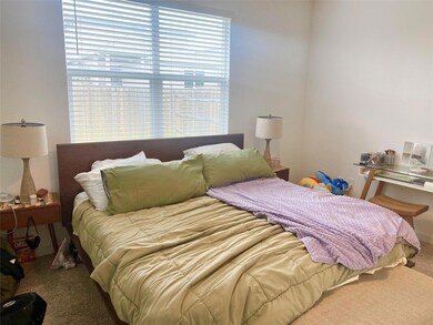 Bedroom featuring carpet floors