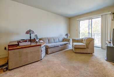 Living Room and Slider to Balcony