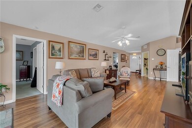 Living room with laminate wood floors.