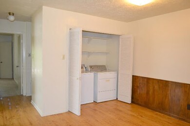 Clothes washing area with laundry area, wainscotin