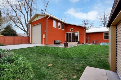 Large backyard with alley access to the 14' rear g