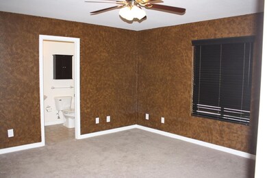 One of two master bedrooms