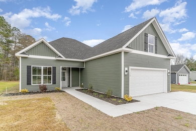 View of front of home with a front lawn, roof with