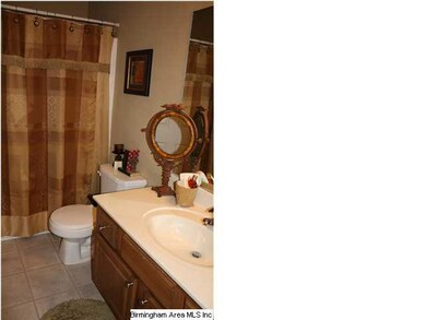 Full bathroom in hall of main level with tub/shower combo