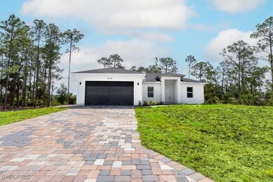 View of front of property featuring decorative dri