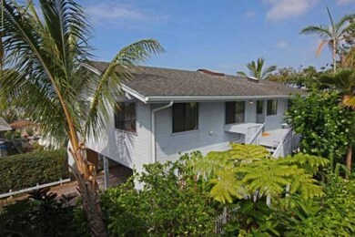 Cute as a button and on a small low maintenance CPR'd lot.... foliage in foreground belongs to neighbors.