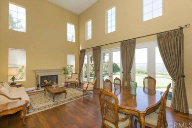 Stylish Formal Living Room with Newer Plank Wood F