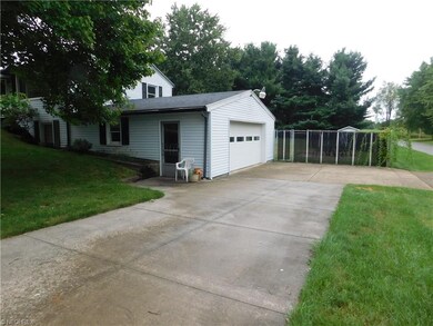 2 driveway entrances to the large 2 car garage