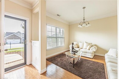 Front Door w/Dining Room to the right. Currently being used as a sitting room.