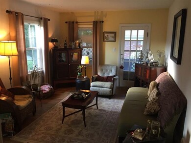 Large living room with access to the side porch.