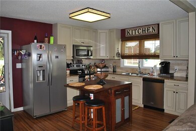 Movable island in custom kitchen