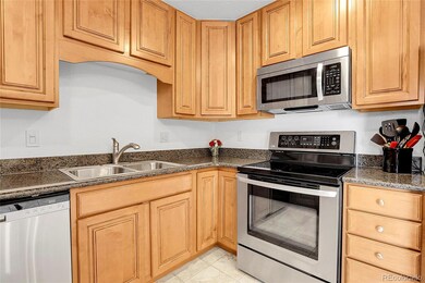 Kitchen boasting Granite tops, gorgeous cabinets, and SS appliances!