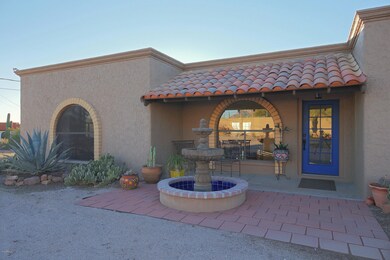 Fountain and Arched Window Entry