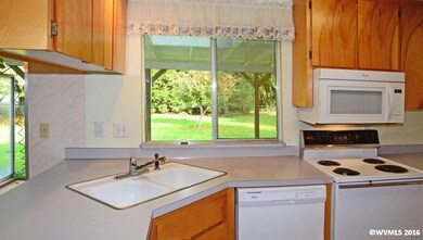 Corner sink to look out over large back yard.