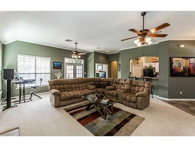 Living Room. Large windows allow for a lot of natu