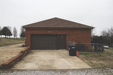 Side of the Home has 2 Car Garage, Deck and Fenced Back Yard