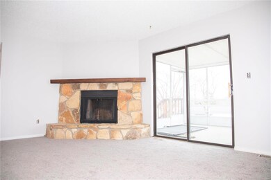Family Room with walkout to screened-in deck - new