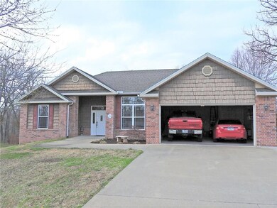 Garage will fit full sized truck. Garage is heated and air conditioned would make a great work shop.