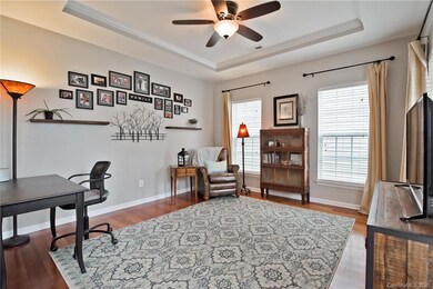 Formal Living/Flex Room with tray ceiling/ceiling fan & 5