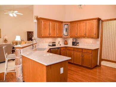 Beautiful wood flooring and granite countertops in