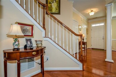Front entrance showing gleaming hardwood floors!