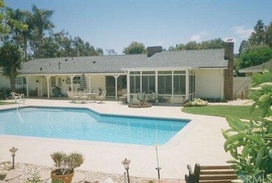 rear yard from horse trail.