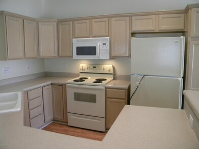 Kitchen toward stove & Refrig