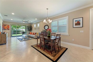 View of great room from hallway leading to garage
