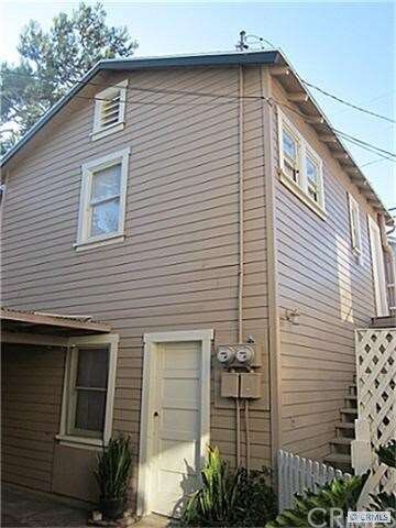 Rear, detached free standing rental apartment over