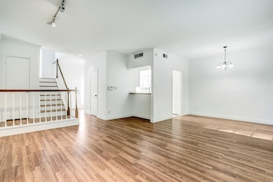 Crown molding and engineered hardwood floors throu