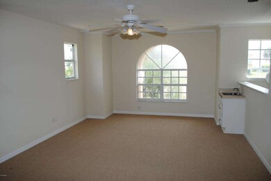 Spacious second level family room w/ bar