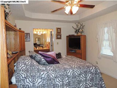 Master bedroom also contains trey ceilings as well as ceiling fans and private full master bath.