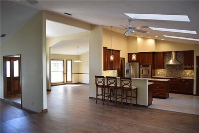 View from family room to kitchen and dining room