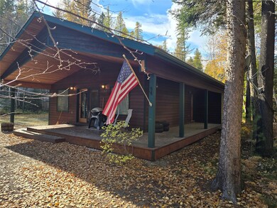 Rear view of house with a deck