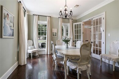Dining Room with glass doors and floor to ceiling