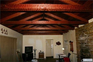 Living room with brick fireplace