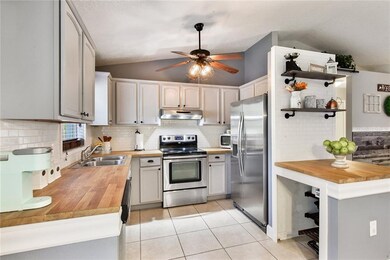 Small counter conceals under cabinet storage for water or pet food
